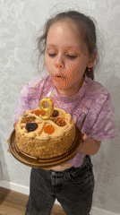 Girl celebrates ninth birthday with cake in Chaikovsky, Russia