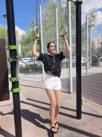 Woman's morning exercise routine captured in Tyumen playground