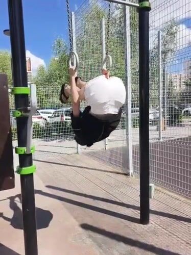 Woman's morning exercise routine captured in Tyumen playground