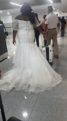 Bride in wedding dress spotted walking through Mexico City airport