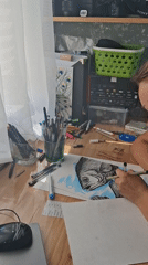 Artist creates detailed fish illustration in Kempelevo studio