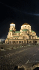 Sofia nighttime scenes feature illuminated cathedral, luxury cars