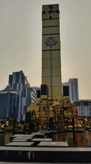 Golden clock tower and Post office observed in Hong Gai Ward