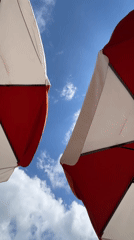Kuta beach hangout: umbrellas, beanbags, and breaking waves
