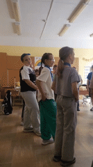 Students gathered in a fluorescent-lit classroom in Chaikovsky, Russia