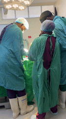Medical team in surgical gear observed in Nairobi operating room