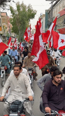 Motorcycle procession with political flags rolls through central Quetta
