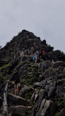 Ma Pi Leng Pass under cloud cover, trails and roads in view