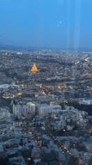 Aerial footage captures Tbilisi cityscape at dusk