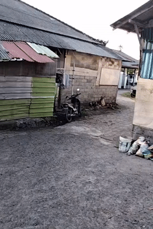 Appliance repair shop and street life in Denpasar