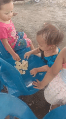 Neighborhood event setup and kids hanging out in Karang Anyar