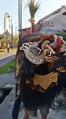 Ornate mythical creature costume at a Blahbatuh ceremony
