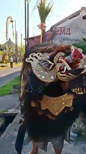Ornate mythical creature costume at a Blahbatuh ceremony