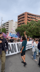 May Day demonstration with communist banners held in Barcelona