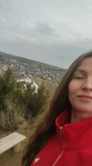 Woman takes selfies in snowy Russian town