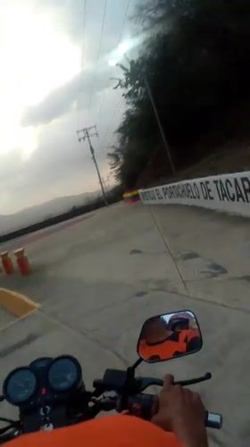 Evening motorcycle ride documented through Tacarigua, Venezuela