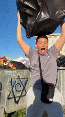Young person documented disposing trash in Sofia neighborhood