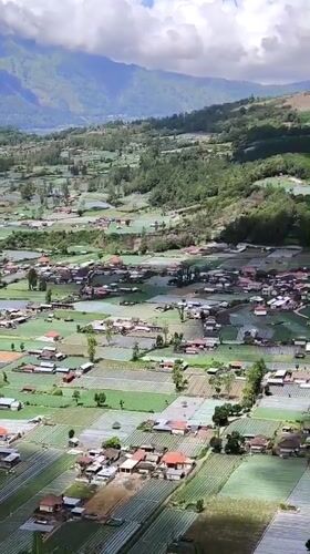Aerial views capture rural Kintamani landscape and walking child