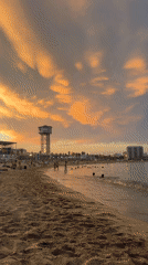 Sunny afternoon on a busy Barcelona beach
