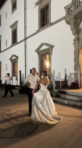 Wedding dance outside a grand building in Signa, Italy