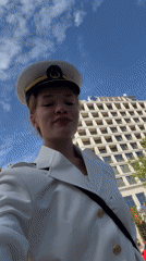 Naval officer takes selfies at Budva marina, Montenegro