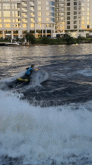 Jet skis, river boats, and bouldering on a Saint Petersburg evening