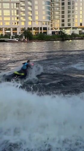 Jet skis, river boats, and bouldering on a Saint Petersburg evening