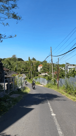 Morning traffic captured on Kuta Selatan road in Bali