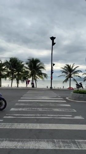 Morning routine unfolds along Nha Trang's beach and park