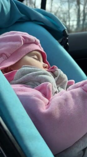 Morning drive through Moscow with sleeping baby captured