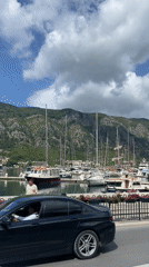 Morning harbor life documented in historic Kotor, Montenegro