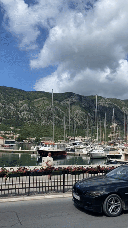 Morning harbor life documented in historic Kotor, Montenegro