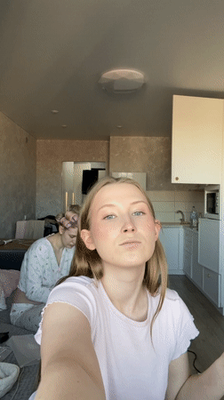 Woman applies makeup in Zubovo, Russia