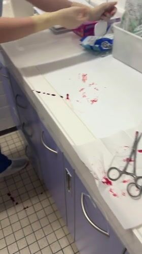 Medical scene with bloodied instruments documented in Tourcoing