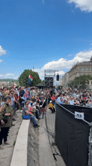 Large crowd gathers for outdoor speaking event in Budapest
