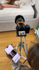 Women conduct bedroom photography session in Izhevsk
