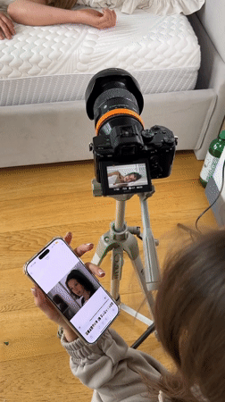 Women conduct bedroom photography session in Izhevsk