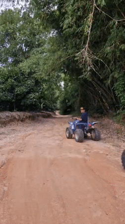 Off-road vehicle group rides dirt road in Ko Samui