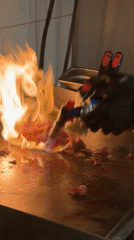 Cook uses blowtorch to sear meat in Tel Aviv