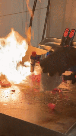 Cook uses blowtorch to sear meat in Tel Aviv