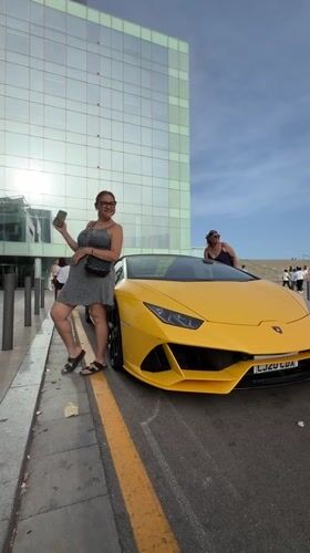 Yellow Lamborghini parked outside W Hotel Barcelona waterfront