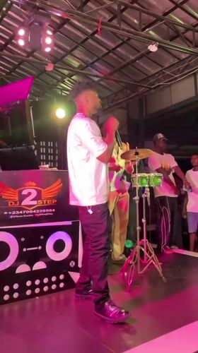 Live music performance draws dancing crowd in Obosi, Nigeria