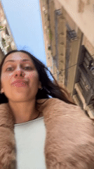 Pedestrians captured in casual moments on Barcelona streets