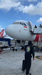 AirAsia Indonesia flight operations captured at Kuta airport