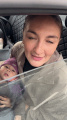 Mother and baby filmed in car window, Sochi