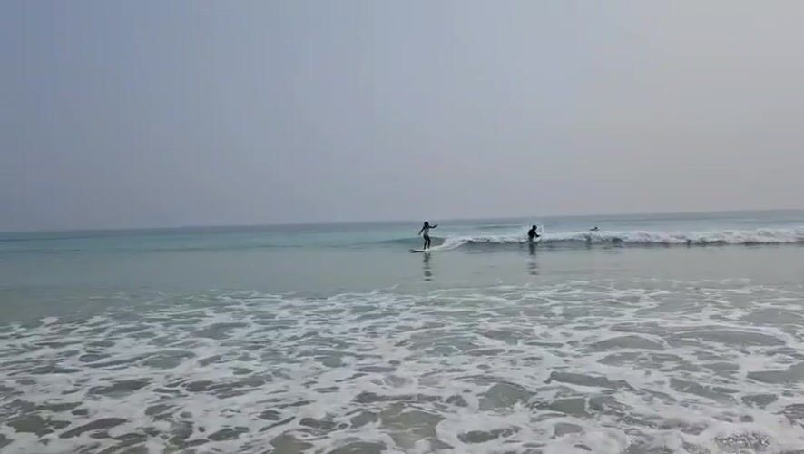 Early morning surfing session documented at Vietnam beach