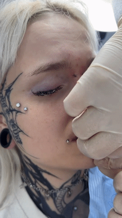 Facial piercing procedure documented in Saratov, Russia
