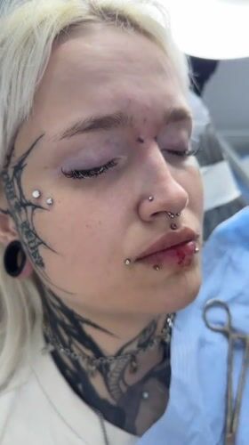 Facial piercing procedure documented in Saratov, Russia