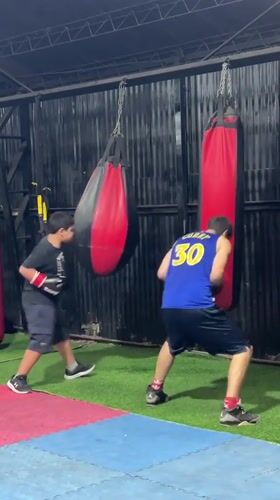 Evening training session at a boxing gym in Arica, Chile