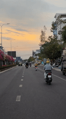 Evening motorbike traffic captured in Vietnamese street scene